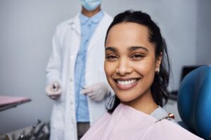 smiling patient in the dentist chair